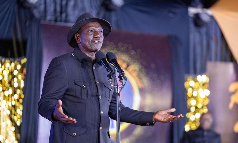 President William Ruto addressing mourners at the funeral of Raila Odinga's bodyguard George Oduor on April 12, 2025