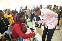 Labour Cabinet Secretary Dr Alfred Mutua interacts with jobseekers at Wote town on November 21, 2024.