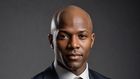 A bald black man