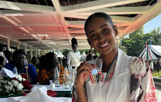 Sarah Hassan shows off her OGW medal awarded by President William Ruto during a luncheon at State House, Nairobi