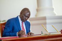 President William Ruto signs a bill into law at State House, Nairobi