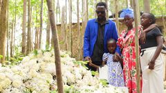 Lion Deh and his son during burial