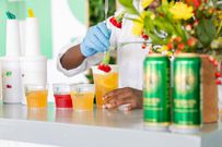 A bartender making cocktails at the Davis Cup polo tournament