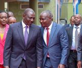 President William Ruto speaking with Treasury CS John Mbadi during a past function