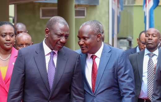 President William Ruto speaking with Treasury CS John Mbadi during a past function