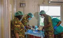 KDF doctors, specialist officers, perform an operation