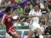 File image of former Manchester City footballer Mikheil Kavelashvili (in white) in action in a football game in 2006.