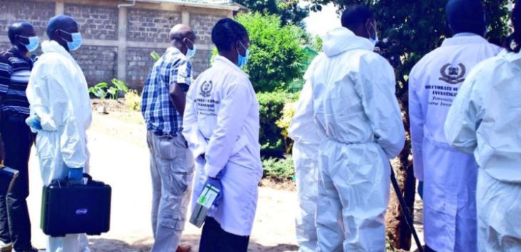 File image of DCI detectives at a crime scene