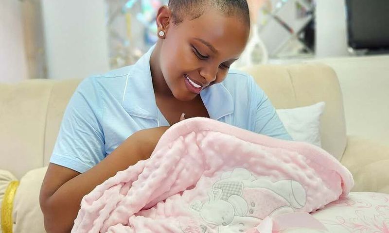 Actress Dorea Chege and her child