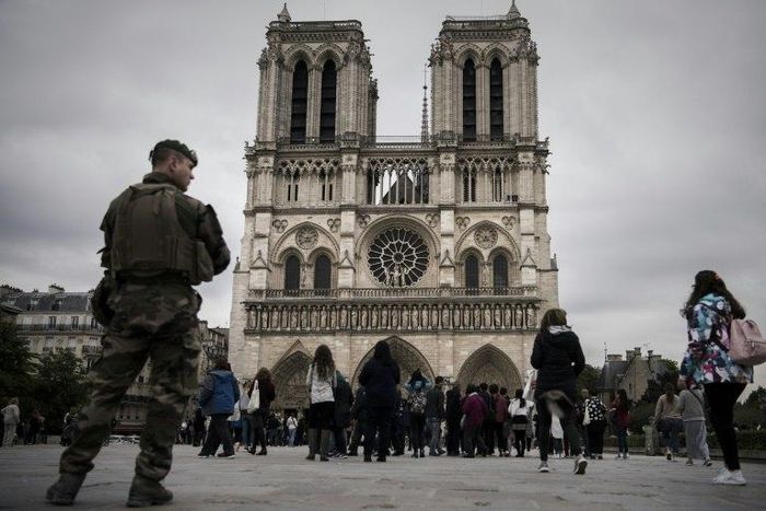 A French soldier stands guard in front of Notre-Dame Cathedral in Paris