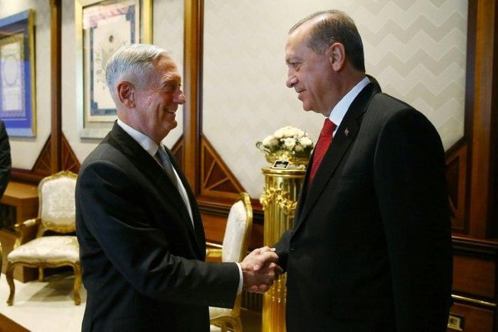 Turkish President Recep Tayyip Erdogan (R) greets US Defense Secretary James Mattis, in Ankara for talks focussed on US arming of a Syrian Kurdish militia, which Turkey views as a terror group. Picture by Turkish Presidential press service.
