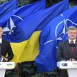 NATO chief Jens Stoltenberg (left) vowed at a press conference in Kiev with President Petro Poroshenko that the alliance stood by Ukraine