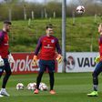 (L-R) England goalkeepers Fraser Forster, Tom Heaton and Joe Hart take part in a team training session at St George's Park in Burton-on-Trent, central England on March 21, 2017