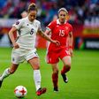 Germany's defender Babett Peter (L) scored during the women's Euro game against Denmark, setting her team up for a 2-0 victory and a spot in the quarter-finals
