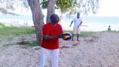 DP William Ruto playing volley ball at the beach