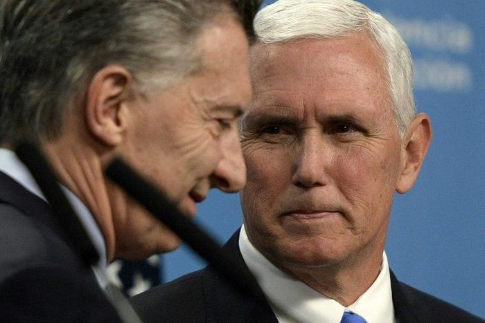 US Vice President Mike Pence (R), seen here in Buenos Aires with Argentina's President Mauricio Macri, heard warnings that "force is not the way" to deal with the crisis in Venezuela