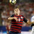Jordan Morris (L) scores twice to give the united States a 3-2 win over Martinique in the CONCACAF Gold Cup in Tampa, Florida