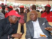 File image of former Minister Simeon Nyachae with President Uhuru Kenyatta.