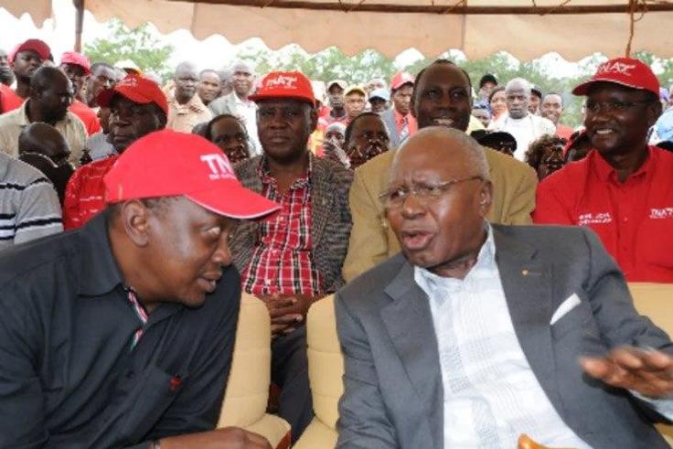 File image of former Minister Simeon Nyachae with President Uhuru Kenyatta.