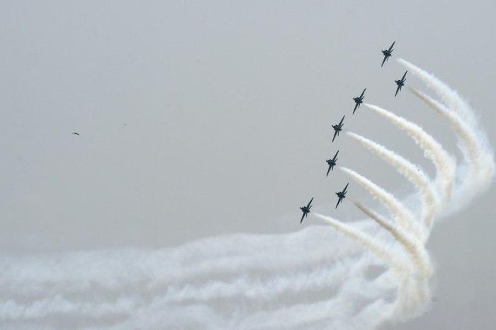 An aerobatics team performs a rehearsal before Pakistan's Independence Day celebrations