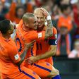 Netherland's Wesley Sneijder (C) celebrates with teammates Arjen Robben (R) and Memphis Depay after scoring a goal during their FIFA 2018 World Cup qualifier against Luxembourg, in Rotterdam, on June 9, 2017