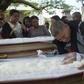 Luis Carlos de Oliveira, 49, mourns his relatives Ana Cristina da Conceicao, 42, and her mother, Marlene Maria da Conceicao, 76, killed by stray bullets during a firefight between police and traffickers in the Mangueira shantytown, in Rio de Janeiro in...