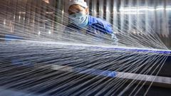 Output by Chinese factories and workshops slowed sharply in July, growing by a lower-than-expected 6.4 percent compared to the same month last year, official figures showed on Monday