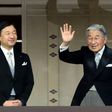 Japan's Emperor Akihito (R) waves to well-wishers, as Crown Prince Naruhito (L) looks on, during their new year greetings in Tokyo January 1, 2015