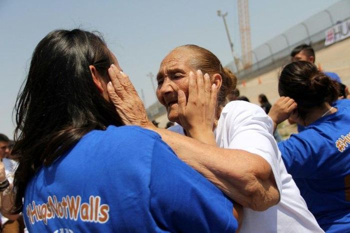 Families separated by the US-Mexico border are reunited for a few minutes in a "Hugs Not Walls" event in Ciudad Juarez, Mexico on June 24, 2017