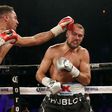Andre Ward (L) battles Sergey Kovalev during their light heavyweight championship bout at the Mandalay Bay Events Center in Las Vegas, Nevada