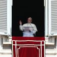 Pope Francis waves to pilgrims gathered in St. Peter's square during his Sunday Angelus prayer on August 20, 2017 at the Vatican