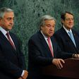 UN Secretary-General Antonio Guterres (C) speaks beside Greek Cypriot leader Nicos Anastasiades (R) and Turkish Cypriot leader Mustafa Akinci on June 4, 2017 at UN headquarters