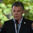 "With the laying down of arms ... the conflict is truly over and a new phase begins in the life of our nation," Colombian President Juan Manuel Santos said