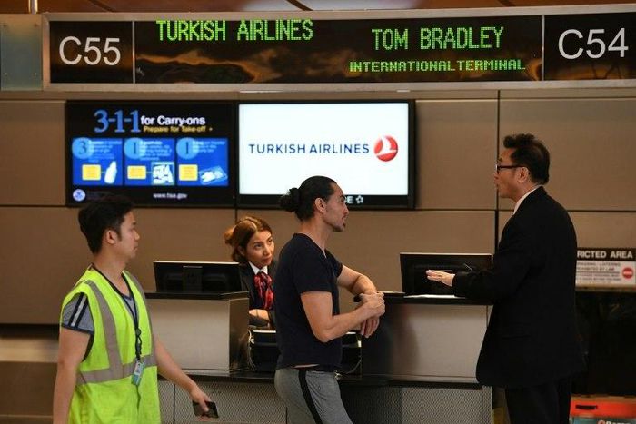 The US has lifted a ban on carrying large electronic devices in the cabin of US-bound flights from Turkey's main international airport