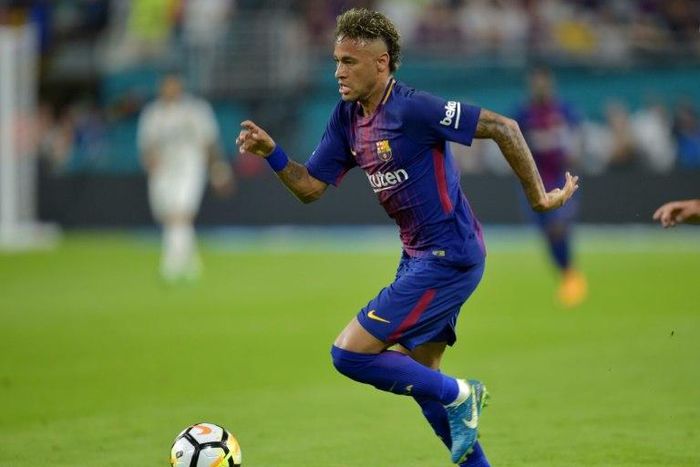 Neymar of Barcelona vies for the ball with Real Madrid during their International Champions Cup football match at Hard Rock Stadium on July 29, 2017 in Miami, Florida