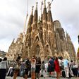 A grief-stricken Barcelona commemorates victims of two devastating terror attacks with a mass in the city's stunning Sagrada Familia church