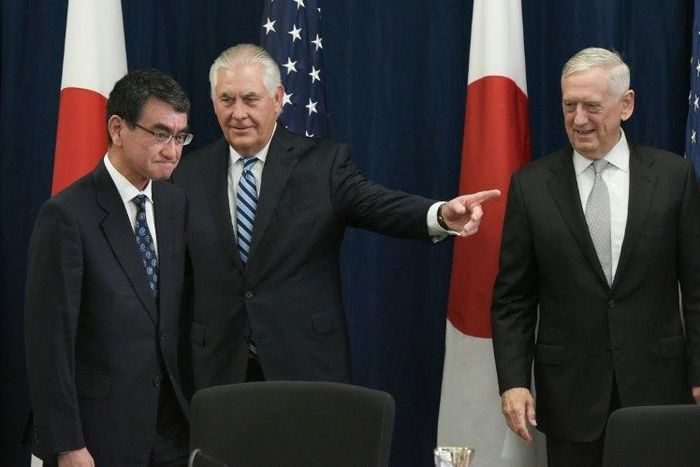 US Defense Secretary James Mattis (R) watches as US Secretary of State Rex Tillerson (C) shows the way to Japan's Foreign Minister Taro Kono ahead of the start of the US-Japan Security talks centered on North Korea