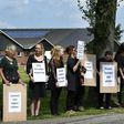 "Chickens have feelings too": Dutch animal activists wave banners and placards as they stage a protest at a poultry farm in Witteveen