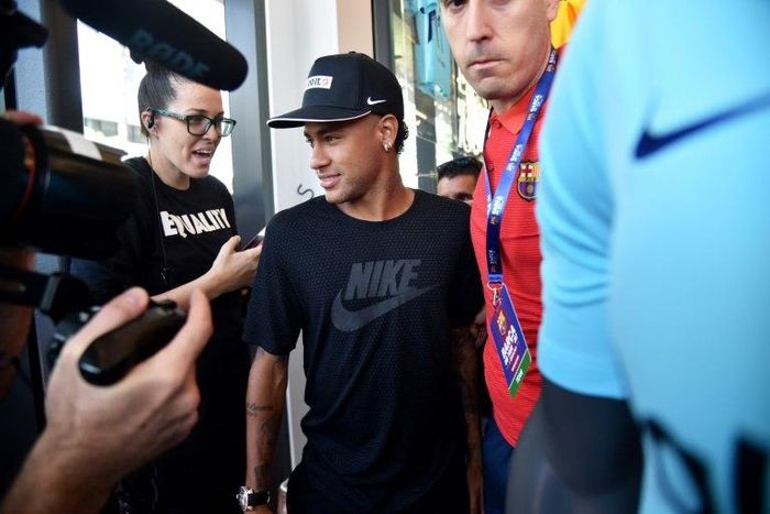 Barcelona's Brazilian forward Neymar takes part in a event organized by a sports shop in Miami, on July 28, 2017