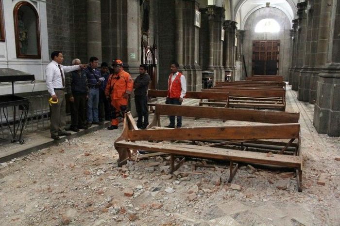 View of damage caused inside a church by an earthquake in Quetzaltenango, 220 km from Guatemala City, on June 14, 2017