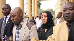 Mugo wa Wairimu being whisked away by CID officers