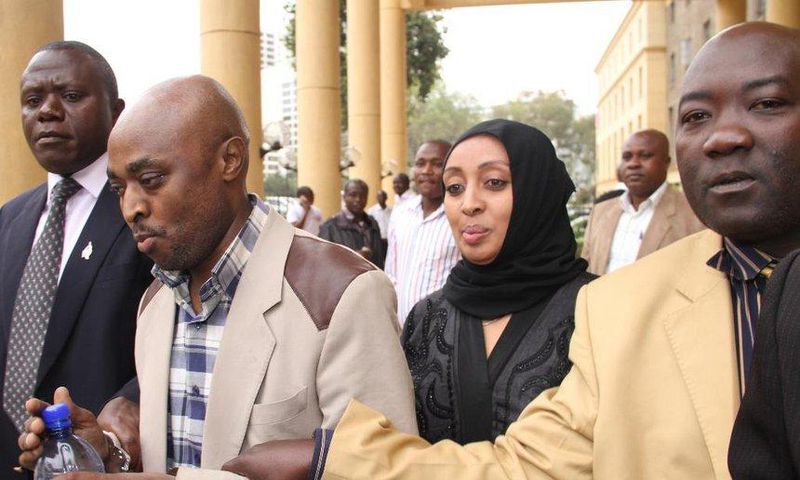 Mugo wa Wairimu being whisked away by CID officers