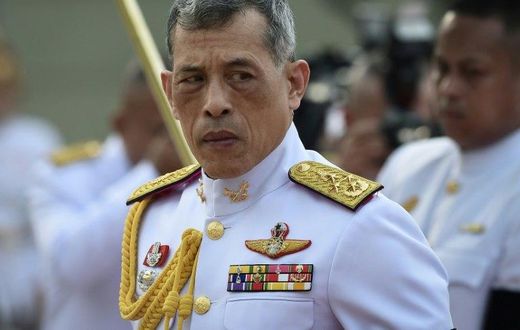 Thailand's King Vajiralongkorn pays respects at the statue of King Rama I after signing the military-backed constitution in Bangkok