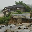 Huge floods engulfing parts of southern Japan have left hundreds stranded