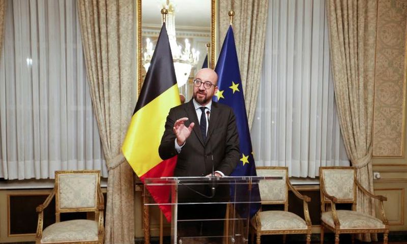 Belgian Prime Minister Charles Michel has steadfastly defended the UN migration pact, saying the international "credibility" of Belgium was at stake