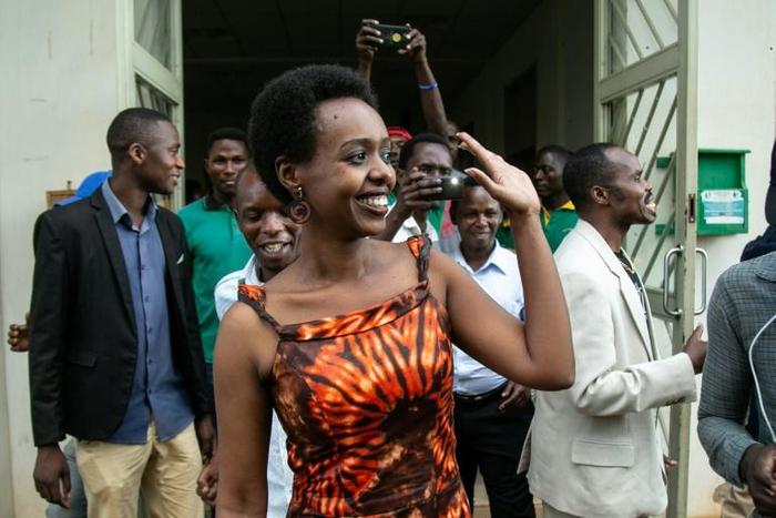 Diane Rwigara waves as she leaves the High Court on December 6 after judges dropped charges against her. The prosecution says it will appeal.