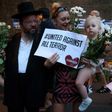 People gather to attend a vigil outside Finsbury Park Mosque, close to the scene of a van attack in Finsbury Park, north London on June 19, 2017