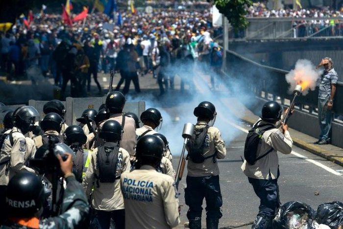 Venezuelan security forces are accused of running over, attacking and robbing protesters and journalists