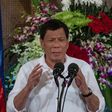 Rodrigo Duterte ends his first year as Philippine president hugely popular, taking Filipinos on a promised "rough ride" of drug war killings and foreign policy U-turns