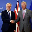 British Brexit minister David Davis (L) attracted criticism for leaving for London after a brief meeting with Michel Barnier